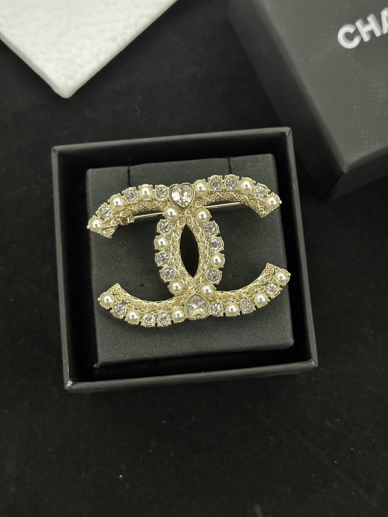 Ch**el brooches